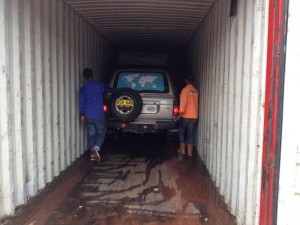 Cars being loaded into containers at Batam 4