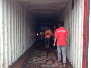 Cars being loaded into containers at Batam 5 