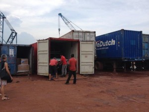 Cars being loaded into containers at Batam 9 